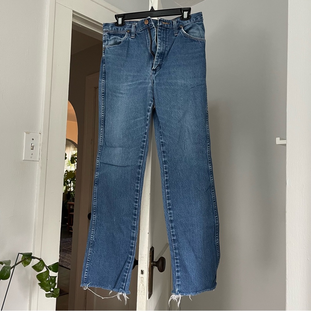Wrangler Blue Jeans with Frayed Bottoms